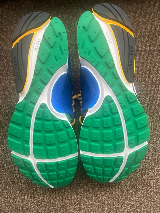 Nike Kids Teal Mesh Sneakers with Bright Yellow Accents main image 11
